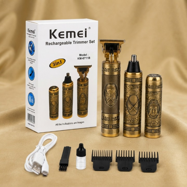 Kemei 3-in-1 rechargeable trimmer set with three gold-patterned electric trimmers, a white USB charging cable, a small cleaning brush, a white bottle, and four black guide combs, displayed next to its white product box on a beige fabric background.