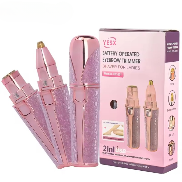 Pink battery-operated eyebrow trimmer with packaging on a white background