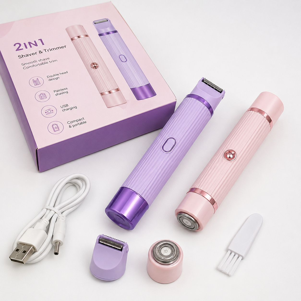 A 2-in-1 electric shaver and trimmer set shown with its retail box, charging cable, two interchangeable heads, and a small brush on a clean white background. The devices are pastel purple and pastel pink with metallic rose-gold accents.